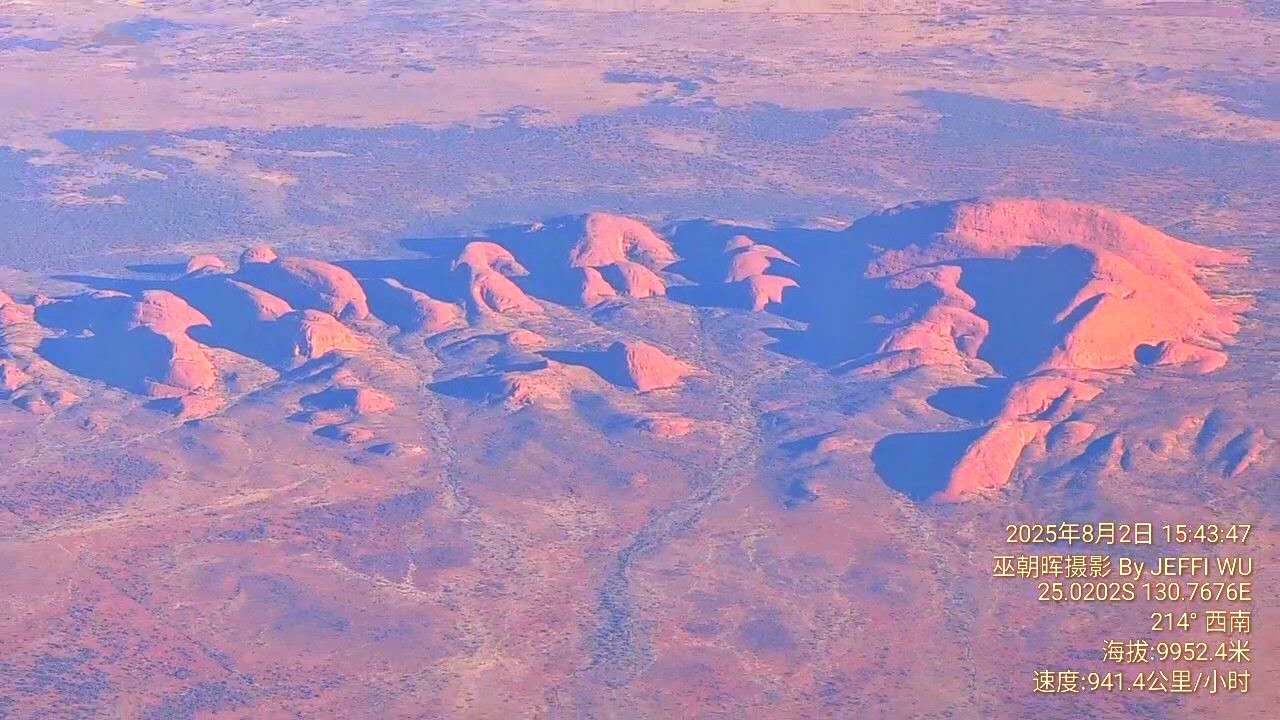 2 August 2025. The author photographed Kata Tjuta from an altitude of approximately 9,951 metres while flying over central Australia. The image captures the distinctive geological formations of Kata Tjuta under the interplay of sunlight and shadow.